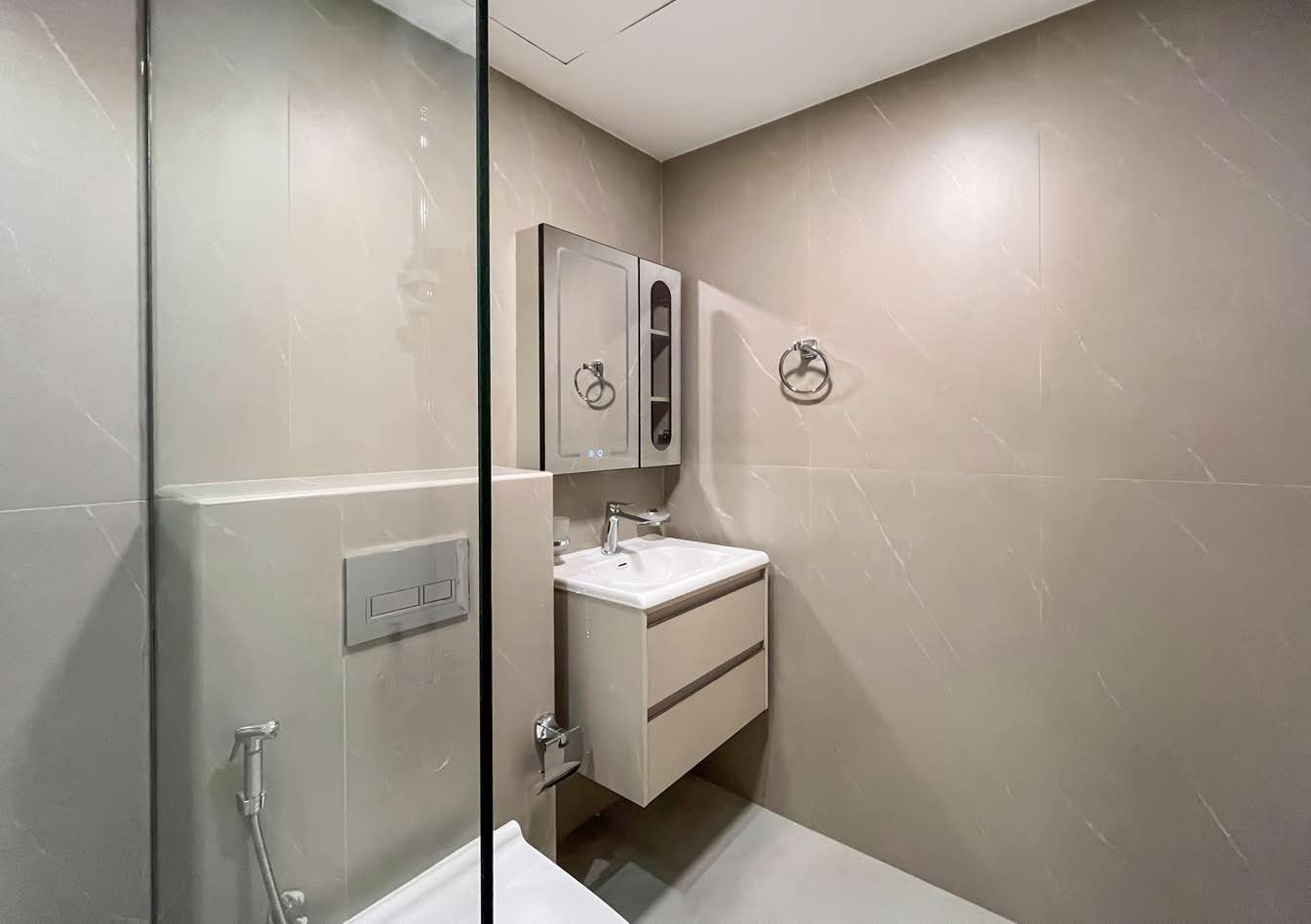 Marble-effect tile, floor to ceiling