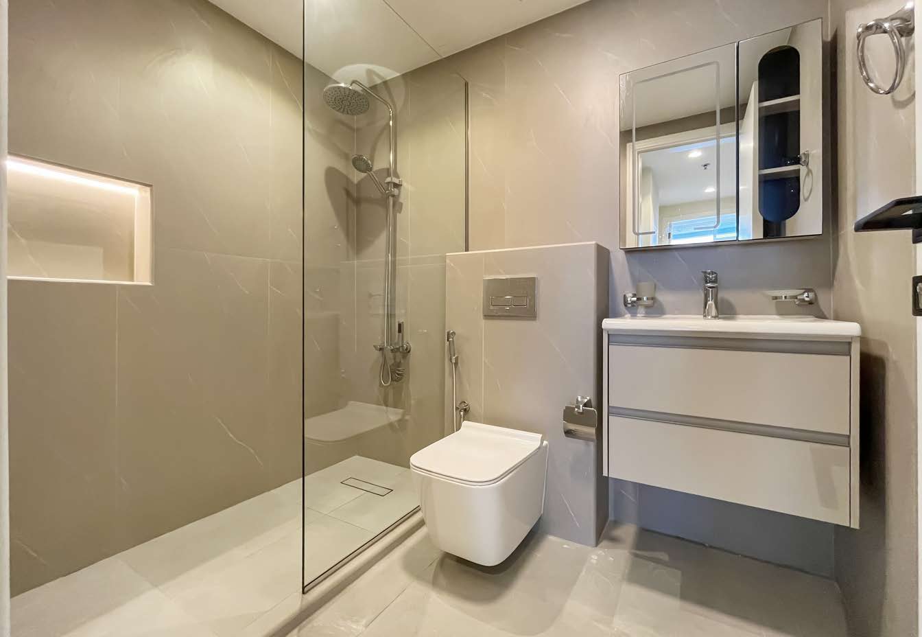 Bathroom — walk-in shower & lit niche